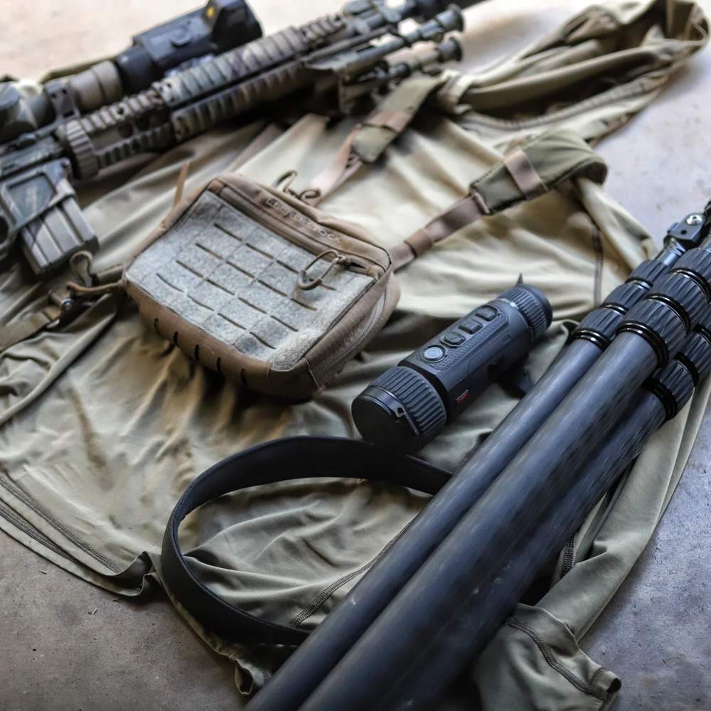 Working loadout flat lay, Eberlestock pouch centered